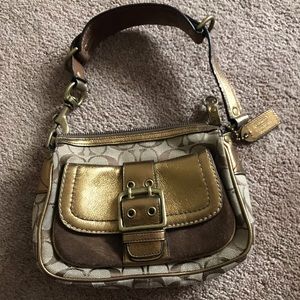 Brown Coach shoulder bag.